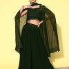 green solid flared lehenga with sequined blouse