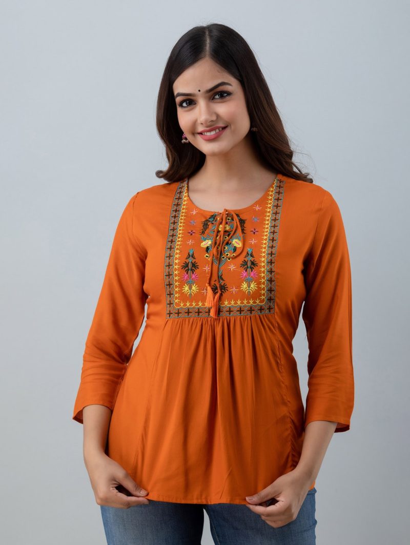 orange solid with embroidered a-line tunic